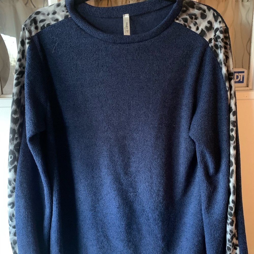 Blue sweater with cheetah stripes